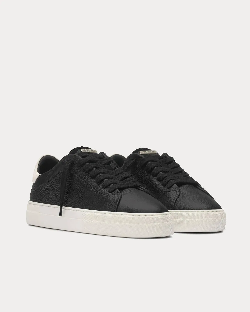 The Core Black Low Top Sneakers
