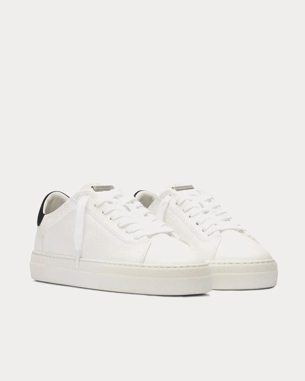 The Core Flat White Low Top Sneakers