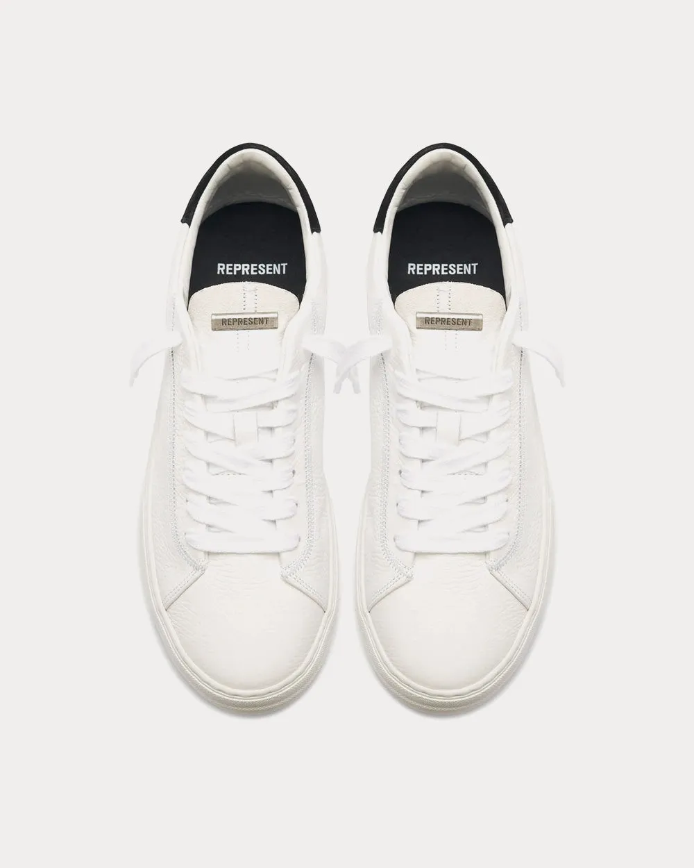 The Core Flat White Low Top Sneakers